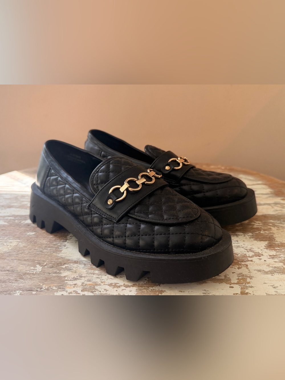 Cato Black Quilted Platform Loafers with Gold Chain